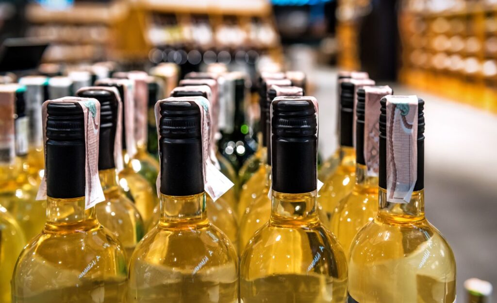 white wine bottles in wine shop